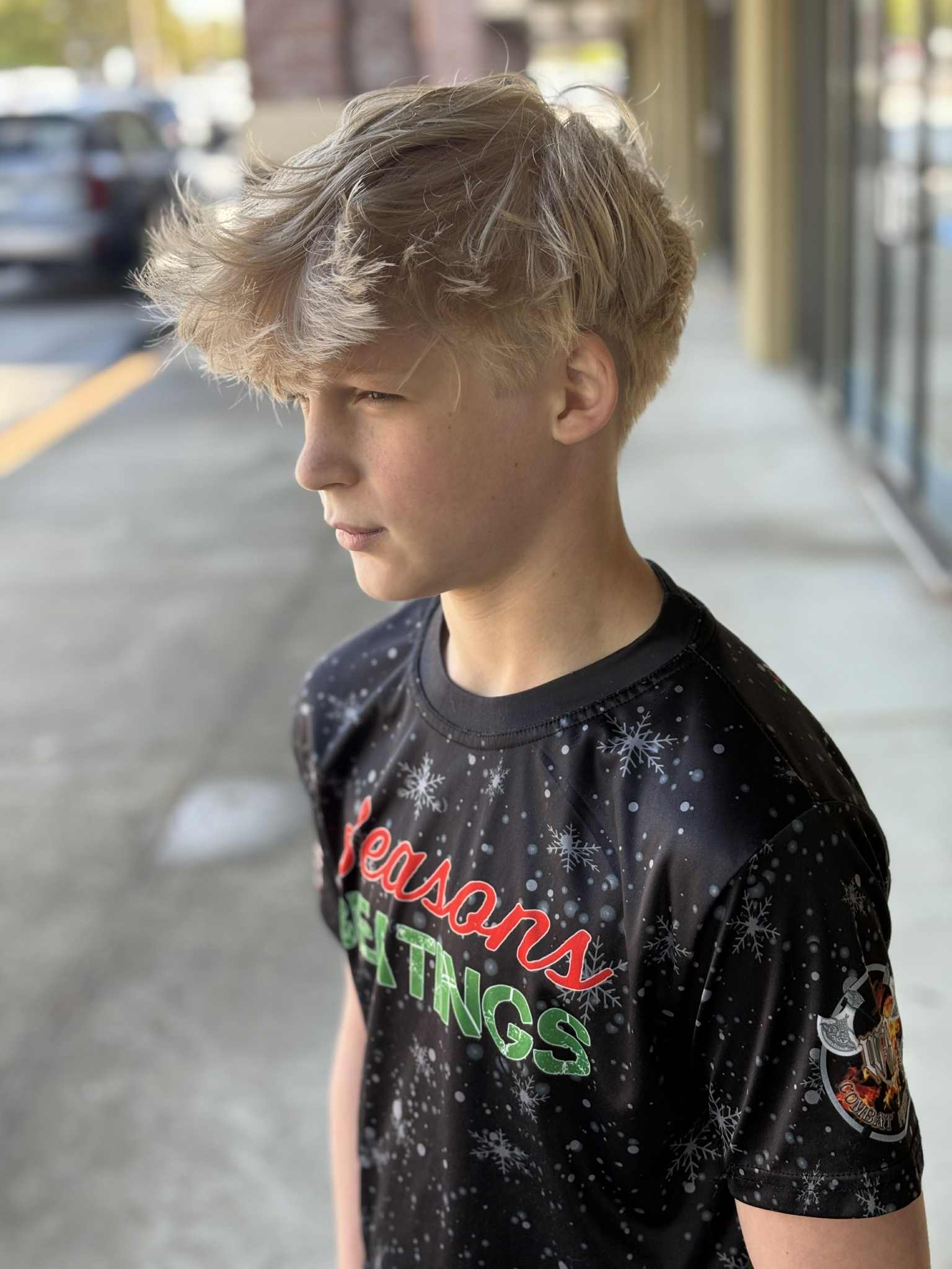 Teen with a layered, textured cut and a clean taper